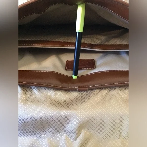 Leather Crossbody bag w/interior organizer pocket, and built-in laptop section.
